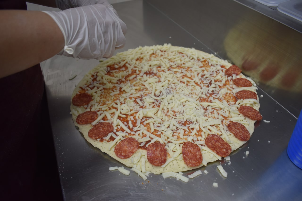 The team baked pizzas according to a new recipe